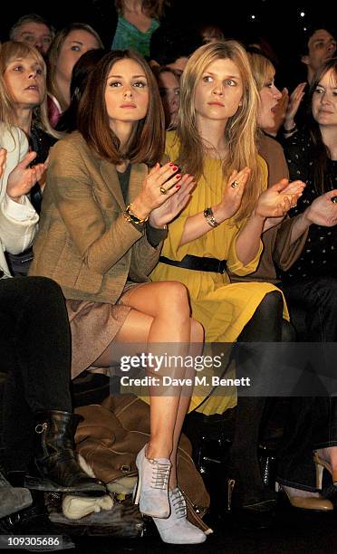 Olivia Palermo and Clemence Posey sit in the front row at the Mulberry Salon Show at London Fashion Week Autumn/Winter 2011 at Claridge's Hotel on...