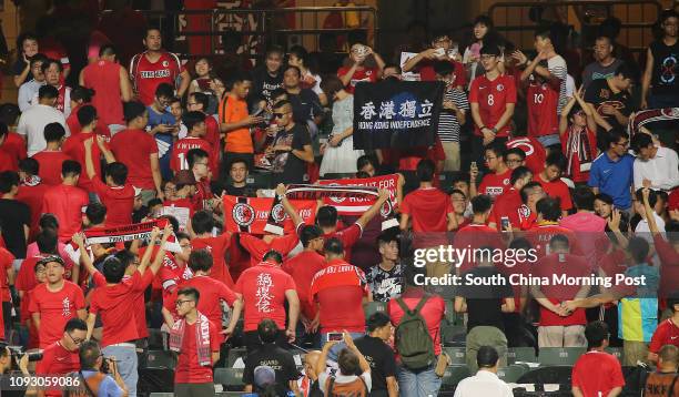 Hong Kong Football fans turn their back to stadium while China's National anthem plays before 2019 Asian Cup qualification Hong Kong vs Malaysia at...