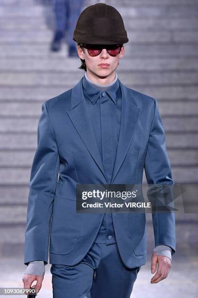 Model walks the runway at the Ermenegildo Zegna Fall/Winter 2019-2020 fashion show during Milan Menswear Fashion Week Autumn/Winter 2019/20 on...