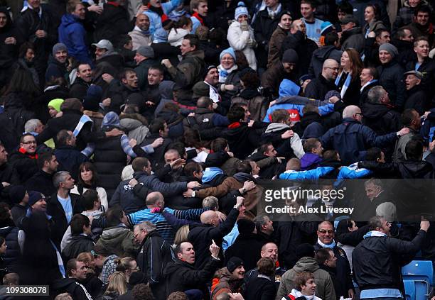 The Man City fans celebrate Micah Richards goal during the FA Cup sponsored by E.On 4th Round replay match between Manchester City and Notts County...