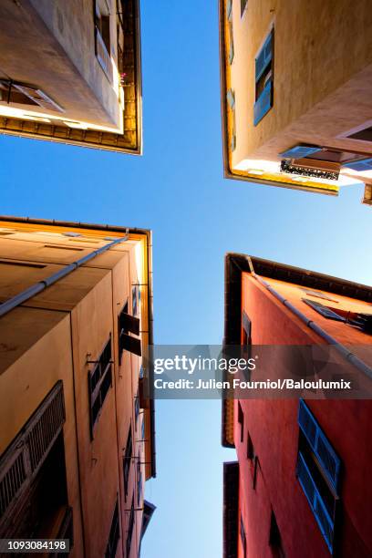 intersection of alleys in old nice, france - nice old town stock pictures, royalty-free photos & images