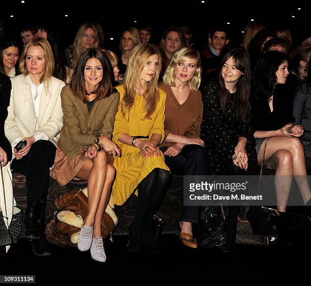 Kate Reardon, Olivia Palermo, Clemence Posey, Kirsten Dunst, Leith Clark, and Gemma Arterton sit in the front row at the Mulberry Salon Show at...