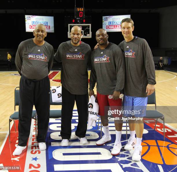 Legends George Gervin, Ron Harper, Mitch Ritchmond and Detlef Schrempf pose for a photo after the Legends Shootout on center court at Jam Session...