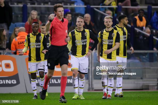 Thulani Serero of Vitesse, referee Martin van den Kerkhof , Alexander Buttner of Vitesse, Max Clark of Vitesse during the Dutch Eredivisie match...