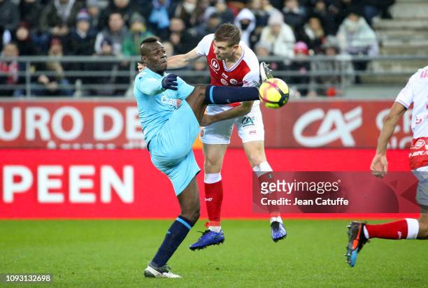 Mario Balotelli, Bjorn Engels of Reims during the french Ligue 1 match between Stade de Reims and Olympique de Marseille at Stade Auguste Delaune on...