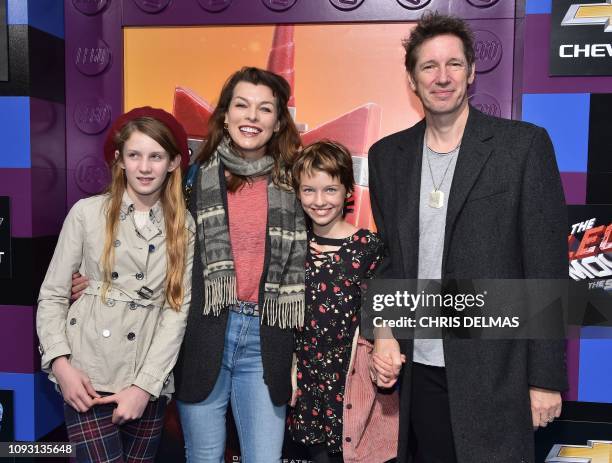 Actress Milla Jovovich, husband Paul W. S. Anderson and children Ever Gabo ANderson and Dashiel Edan Anderson arrive for the premiere of "The Lego...