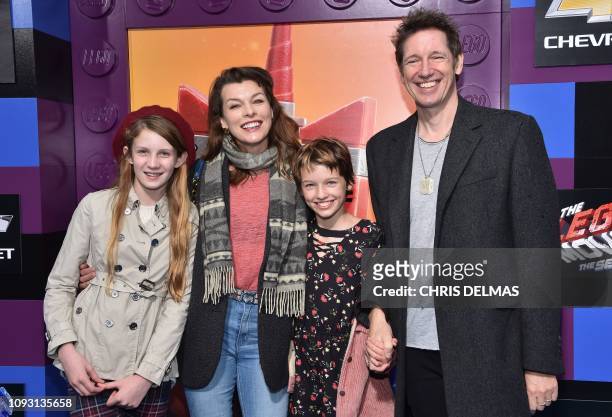 Actress Milla Jovovich, husband Paul W. S. Anderson and children Ever Gabo ANderson and Dashiel Edan Anderson arrive for the premiere of "The Lego...