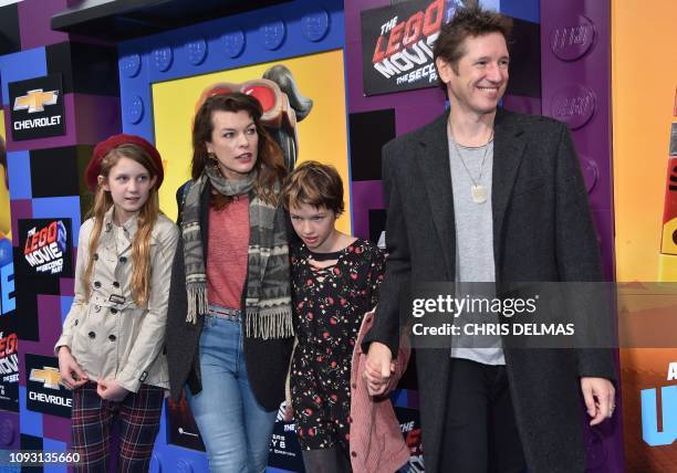 Actress Milla Jovovich, husband Paul W. S. Anderson and children Ever Gabo ANderson and Dashiel Edan Anderson arrive for the premiere of "The Lego...