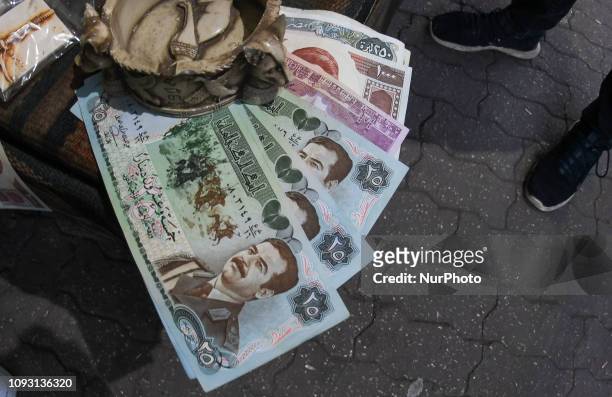 Old Iraq banknotes for sale in the Old Town of Amman. On Saturday, February 2 in Amman, Jordan.