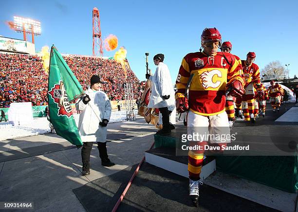 Jarome Iginla of the Calgary Flames walks out to the ice to play against the Montreal Canadiens during the 2011 NHL Tim Hortons Heritage Classic at...