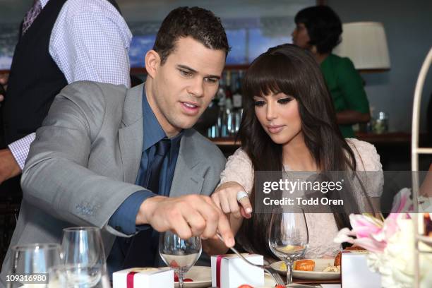 Kris Humphries and Kim Kardashian attend 'A Very Melo Brunch' on February 20, 2011 in West Hollywood, California.