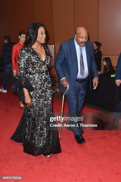 Jim Brown and Monique Brown arrive to Michael Rubin's Fanatics Super Bowl Party at the College Football Hall of Fame on February 2, 2019 in Atlanta,...