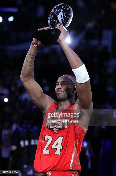 Kobe Bryant of the Los Angeles Lakers and the Western Conference celebrates after being named MVP for the fourth time in the 2011 NBA All-Star Game...