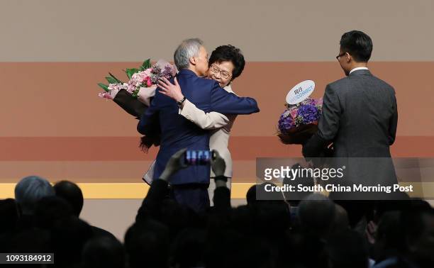 Carrie Lam Cheng Yuet-ngoré??s husband Lam Siu-por , Carrie Lam Cheng Yuet-ngor and her son Jeremy Lam Tsit-sze celebrate on stage after Carrie Lam...