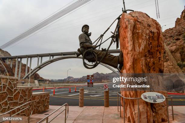 hoover dam heroes - hoover dam statues stock pictures, royalty-free photos & images