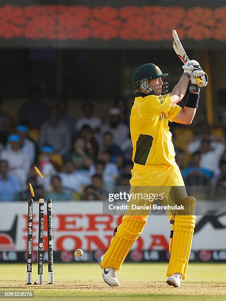 Cameron White of Australia is bowled by Chris Mpofu of Zimbabwe during the 2011 ICC World Cup Group A match between Australia and Zimbabwe at the...