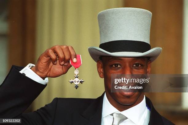 West Ham Utd FC and England International Footballer Ian Wright, Mbe Outside Buckingham Palace after receiving the MBE.