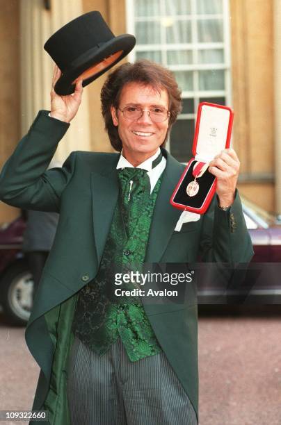 British Singer Sir Cliff Richard Seen outside Buckingham Palace after receiving his Knighthood.