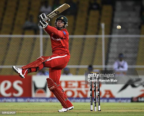 Charles Coventry of Zimbabwe attempts to pull during the 2011 ICC World Cup Group A match between Australia and Zimbabwe at Sardar Patel Stadium on...