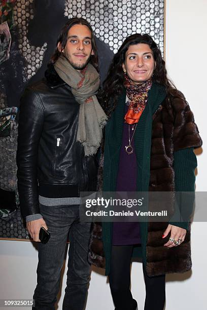 Vladimir Restoin Roitfeld and Giovanna Battaglia attend the Jorg Immendorff show at the Cardi Black Box Gallery on January 21, 2010 in Milan, Italy.