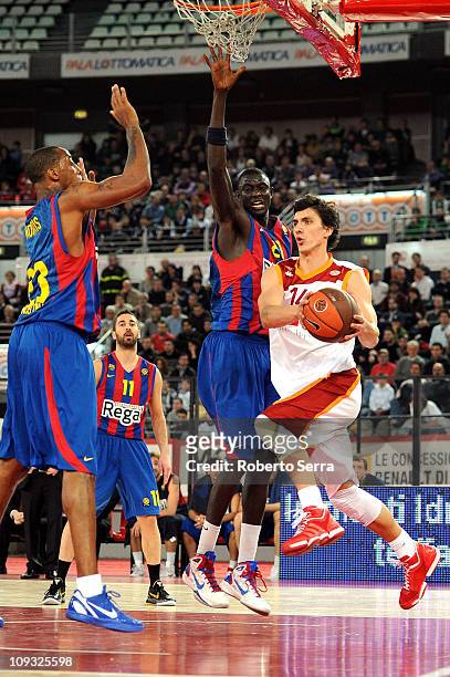Nihad Djedovic of Lottomatica competes with Boniface Ndong and Terence Morris of Barcelona during the 2010-2011 Turkish Airlines Euroleague Top 16...