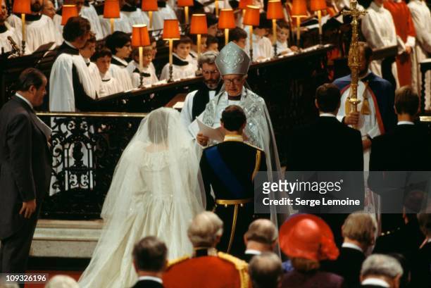 Robert Runcie, the Archbishop of Canterbury officiates at the wedding of Charles, Prince of Wales, and Lady Diana Spencer at St Paul's Cathedral in...