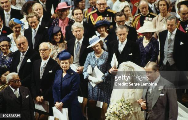 The wedding of Prince Charles and Lady Diana Spencer at St Paul's Cathedral in London, 29th July 1981. The bride arrives on the arm of her father,...