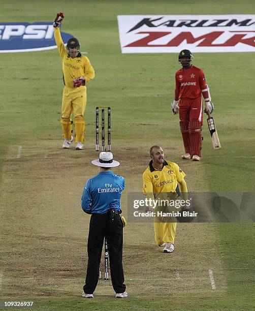 Jason Krejza of Australia celebrates after taking the wicket of Regis Chakabva of Zimbabwe during the 2011 ICC World Cup Group A match between...