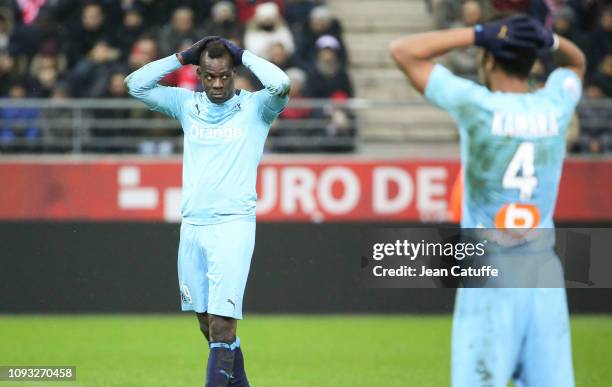 Mario Balotelli, Boubacar Kamara of Marseille during the french Ligue 1 match between Stade de Reims and Olympique de Marseille at Stade Auguste...