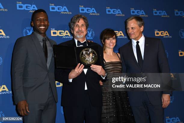 Director Peter Farrelly poses next to actors Mahershala Ali, Linda Cardellini and Viggo Mortensen with the Nomination Medallion for Outstanding...
