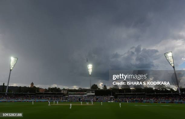 Play continues during day three of the second Test cricket match between Australia and Sri Lanka at the Manuka Oval Cricket Ground in Canberra on...