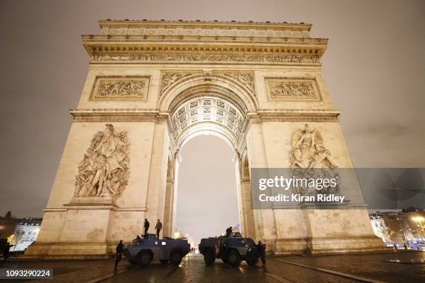 French Armoured Police vehicles guard the Arc de Triomphe after a day of violent clashes between ‘Gilets Jaunes’ or ‘Yellow Vest’ protestors and the...