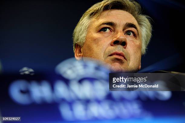 Chelsea Manager Carlo Ancelotti listens to questions during a press conference the day before the UEFA Champions League round of 16 first leg match...
