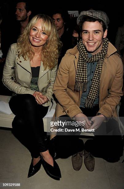 Laura Haddock and Sam Claflin attend the Burberry Prorsum Show at London Fashion Week Autumn/Winter 2011 at Kensington Gardens on February 21, 2011...