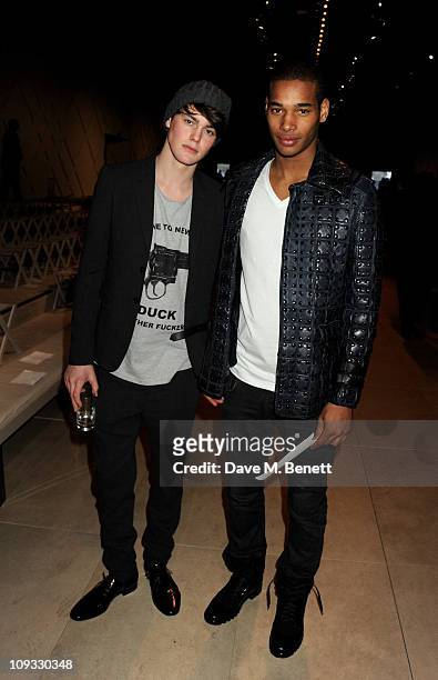 Jacob Young and Sacha M'baye attend the Burberry Prorsum Show at London Fashion Week Autumn/Winter 2011 at Kensington Gardens on February 21, 2011 in...