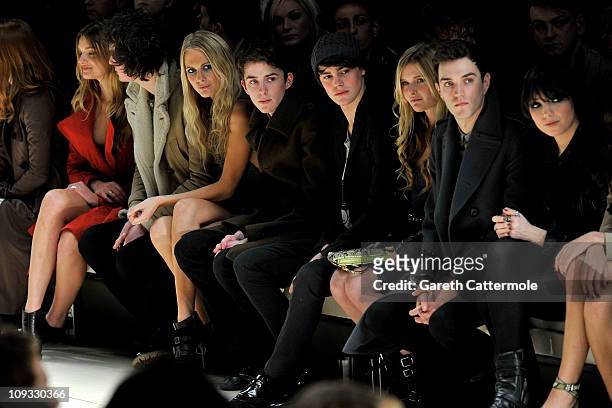Lily Donaldson, George Craig, Poppy Delevingne, Matthew Beard and Jacob Young attend the Burberry Prorsum Show at London Fashion Week Autumn/Winter...