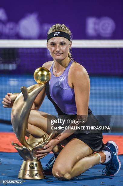 Ukraine's Dayana Yastremska poses with her winning trophy during presentation ceremony after defeating Australia's Ajla Tomljanovic in the final of...