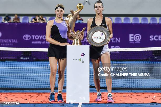 Ukraine's Dayana Yastremska and Australia's Ajla Tomljanovic pose during the presentation ceremony at the end of the final match at the WTA Thailand...