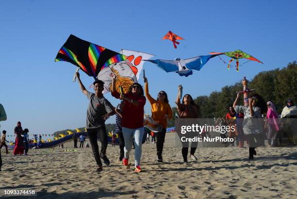 Participant flying colorful kites on the Kite Festival event in Coxs Bazar beach in Bangladesh. On February 01, 2019'National Kite Festival 2019'...