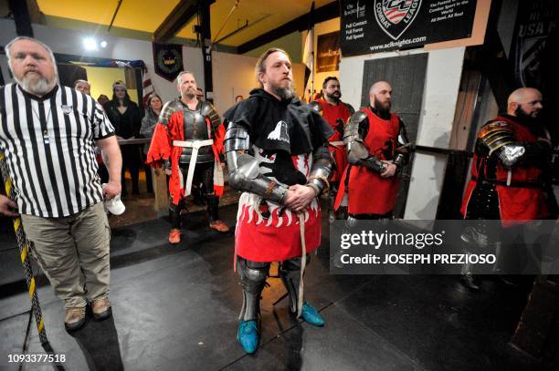 The Nashua Knightmares stand at the National Anthem, during a chapter war match between the Nashua Nightmares and the Manchester Monarchs at the...