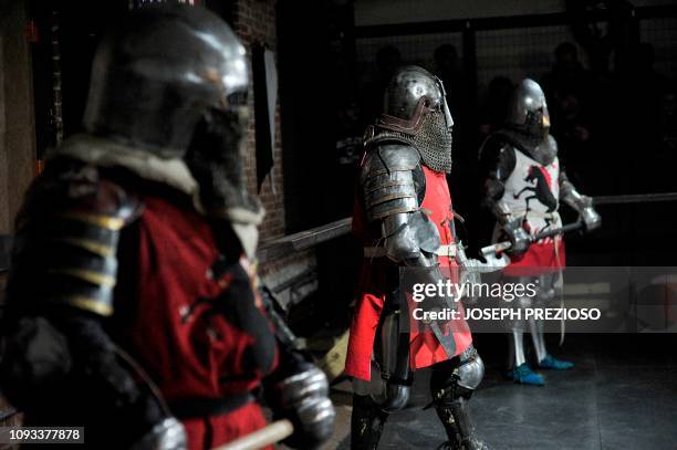 Knights on the Nashua Knightmares prepare to battle with the Manchester Monarchs during a chapter war match at the Armored Combat league Arena,...