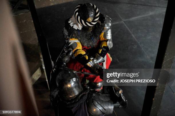 Knights on the Nashua Knightmares battle with the Manchester Monarchs during a chapter war match at the Armored Combat league Arena, Knight's Hall,...