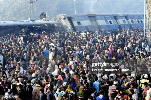 Locals help in the rescue work after a passenger train -- Seemanchal express derailed at Shahdai Buzurg station in Vaishali district of Bihar, on...