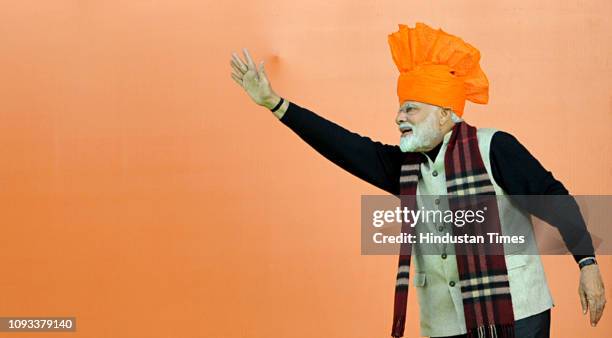 Prime Minister Narendra Modi waves to supporters during a public rally, on February 3, 2019 in Jammu, India. Modi said, "The BJP government will...