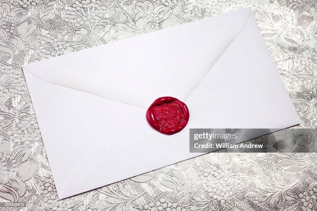 White envelope with red wax seal
