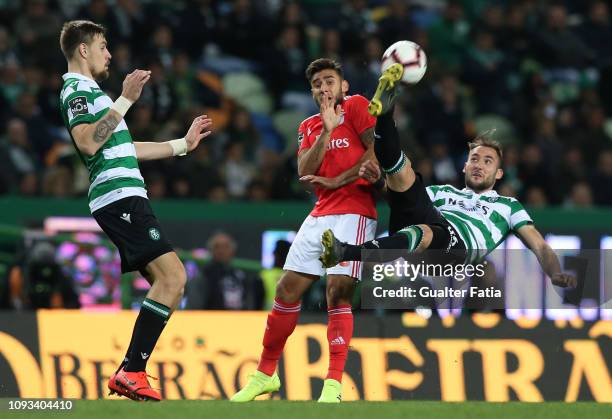 Nemanja Gudelj of Sporting CP with Eduardo Salvio of SL Benfica in action during the Liga NOS match between Sporting CP and SL Benfica at Estadio...