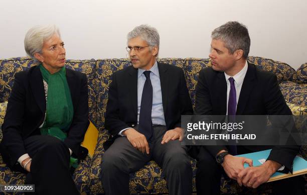 French Economy, Finance and Industry Minister Christine Lagarde and European Affairs Minister Laurent Wauquiez discuss with Tunisian International...