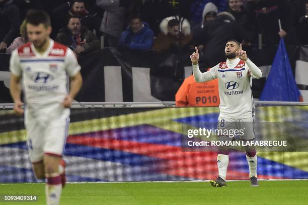 Lyon's French forward Nabil Fekir jubilates after scoring a goal during the French L1 football match between Olympique Lyonnais and Paris-Saint...