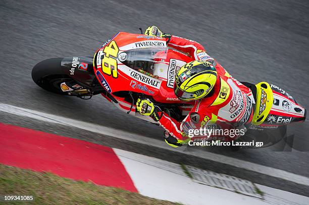 Valentino Rossi of Italy and and Ducati Marlboro rounds a bend during the first day of testing at Sepang Circuit on February 22, 2011 in Kuala...