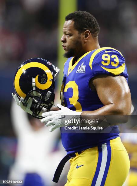 Ndamukong Suh of the Los Angeles Rams looks on during warmups prior to Super Bowl LIII against the New England Patriots at Mercedes-Benz Stadium on...